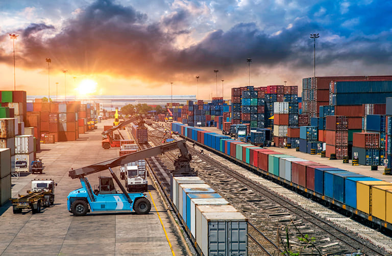 Crane lifting shipping container